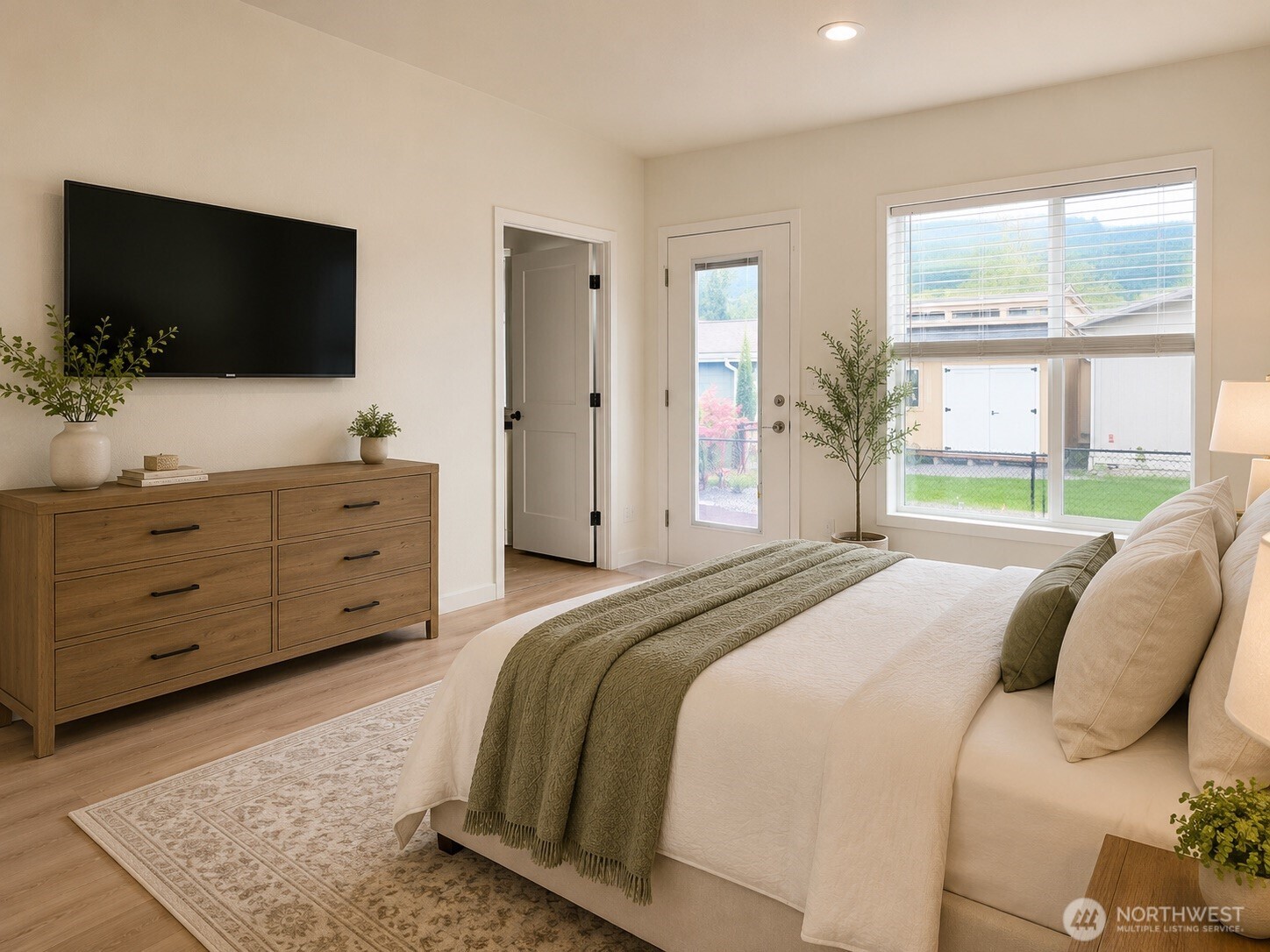 Model bedroom with oversized closet at Crystal Mountain MHC