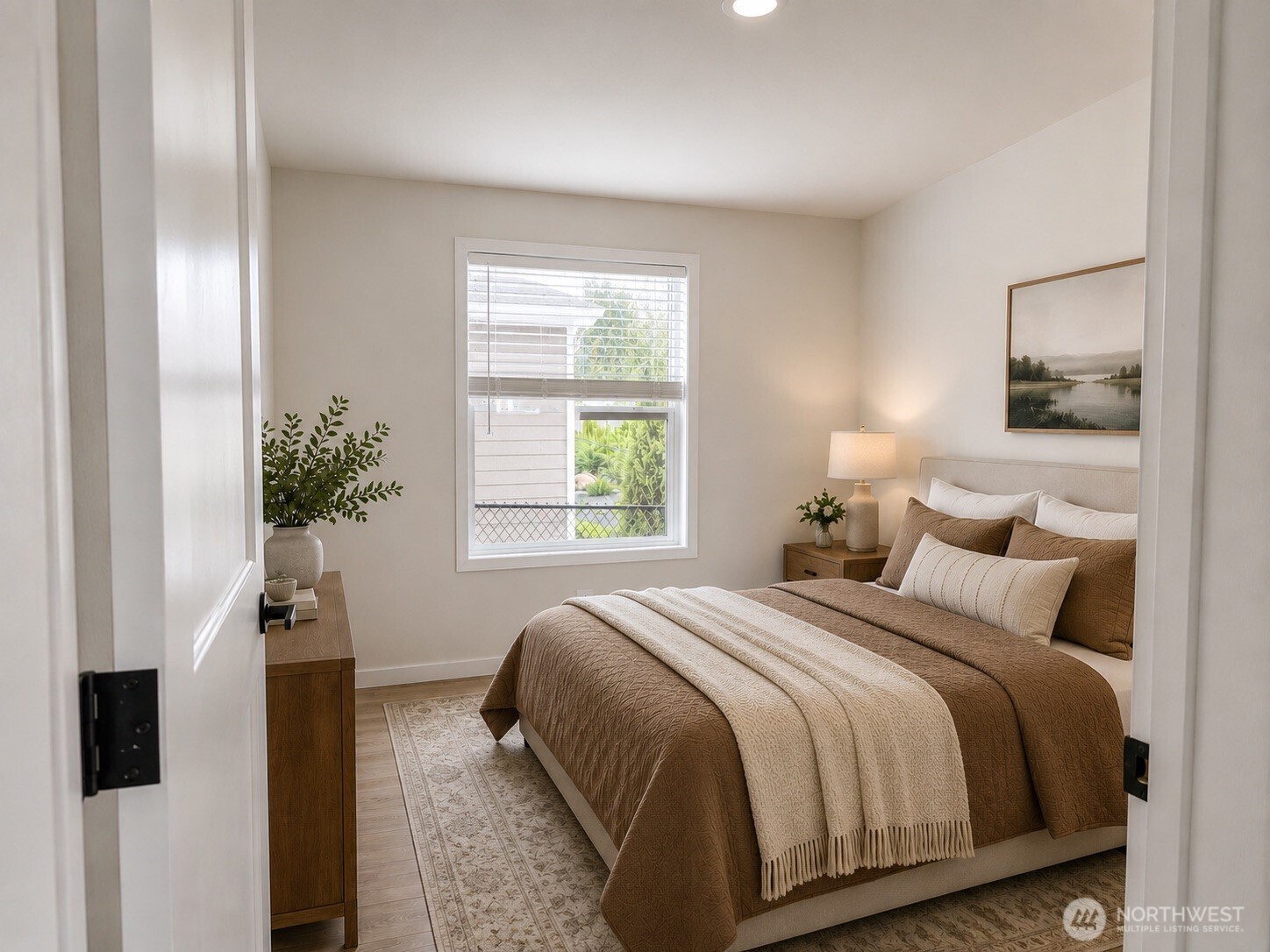 Serene model bedroom at Crystal Mountain MHC