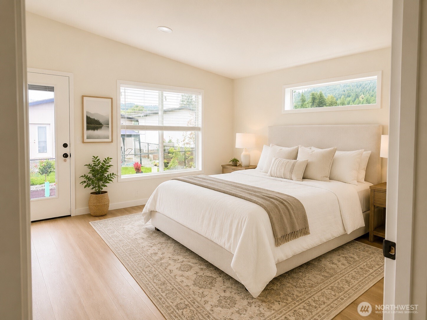 Spacious model bedroom with lots of natural light at Crystal Mountain