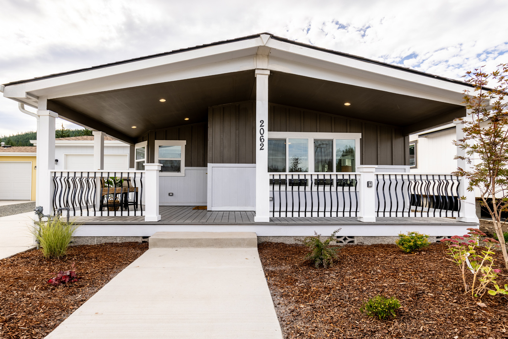 covered veranda and concrete pathway