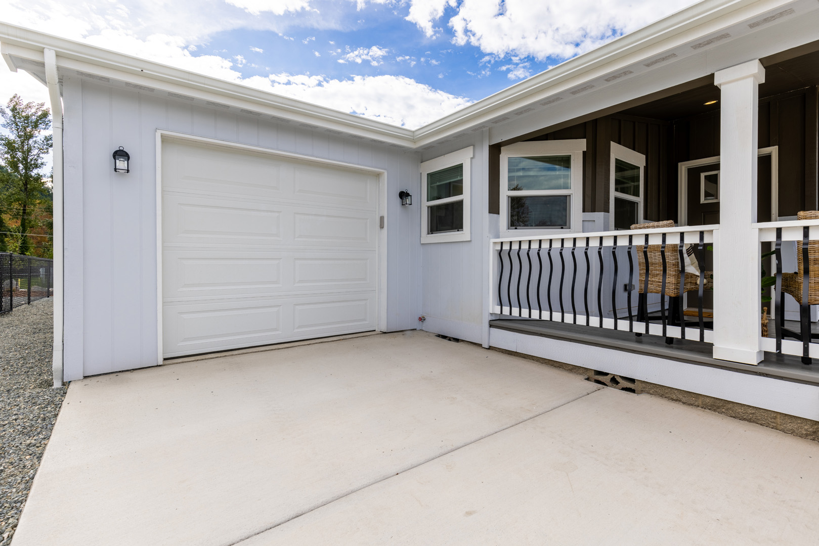 garage and raised outdoor sitting porch
