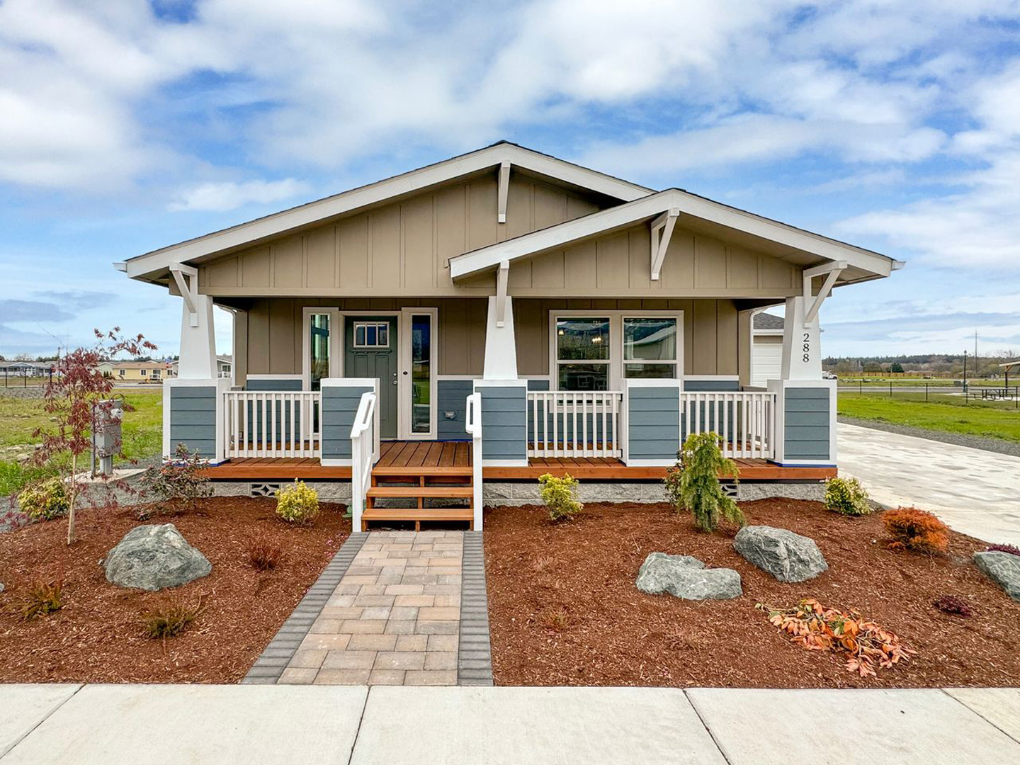 one story cottage facade with walkway