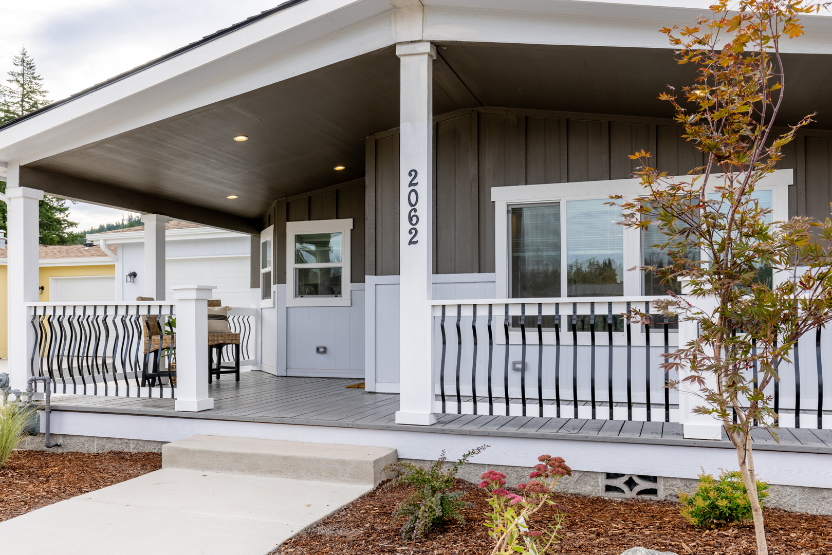 residential front porch with black railing