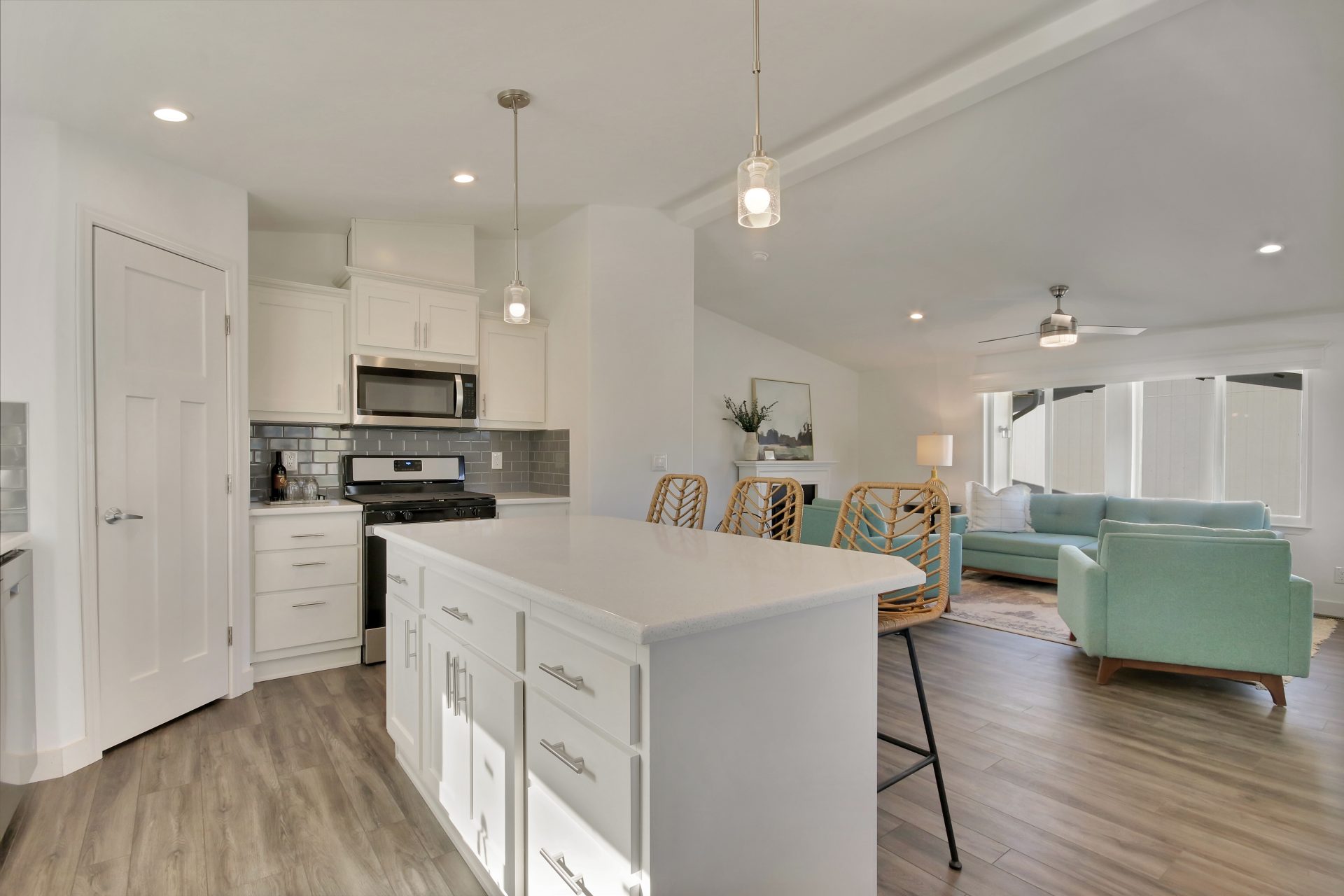 residential kitchen and adjoining lounge